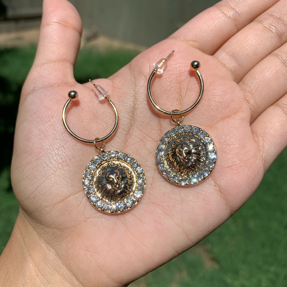 Gold lion head earrings